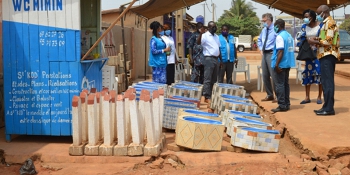 Sanitation Service Delivery: Sanitation products entrepreneurs assure about the provision of “WC MIMIN “products to households after the project has closed during a field visit by a USAID delegation